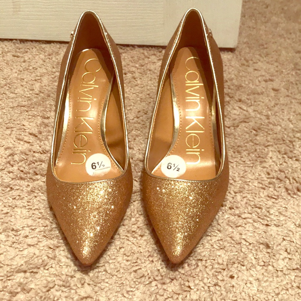 Gold Calvin Klein heel